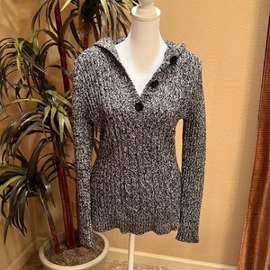 Black & white knit hoodie sweater.  Button v-neck.  Excellent condition. Size L